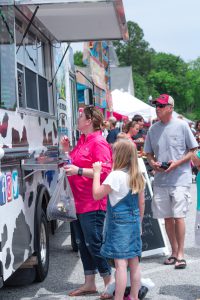 Arts and crafts vendors and food vendors are a big part of the Johnston Peach Blossom Festival.