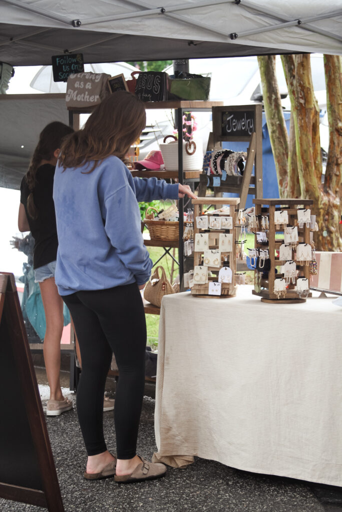 Arts and crafts vendors and food vendors, along with parade entries and entertainment, are a big part of the Johnston Peach Blossom Festival